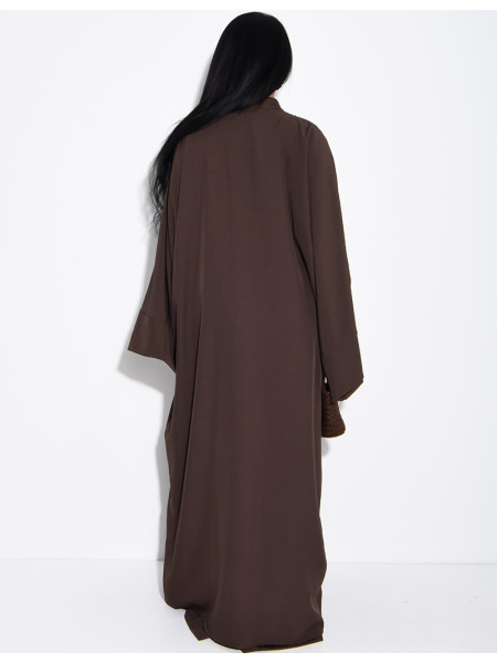 Set comprising trousers and a long tunic with Asian-style fastenings