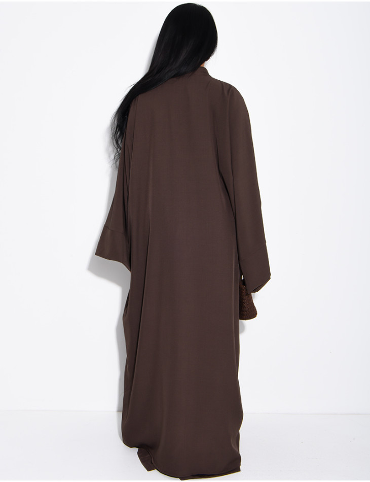 Set comprising trousers and a long tunic with Asian-style fastenings