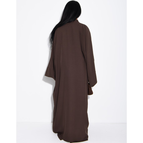 Set comprising trousers and a long tunic with Asian-style fastenings