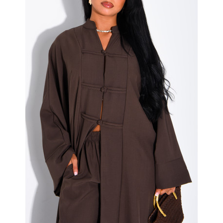 Set comprising trousers and a long tunic with Asian-style fastenings