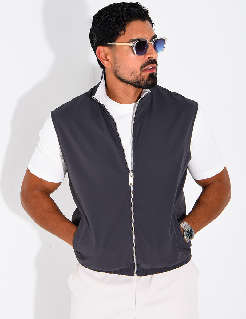 Reversible sleeveless jacket