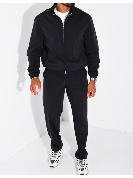 Set featuring a zippered jacket and straight-leg pants made of waterproof fabric
