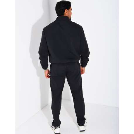 Set featuring a zippered jacket and straight-leg pants made of waterproof fabric
