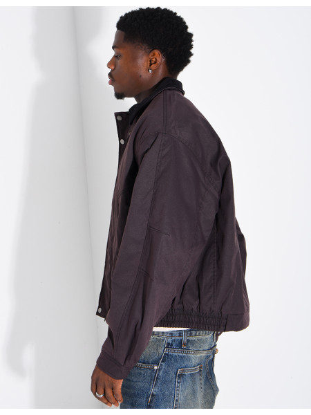 Veste imperméable matelassé à col rabattu en velours