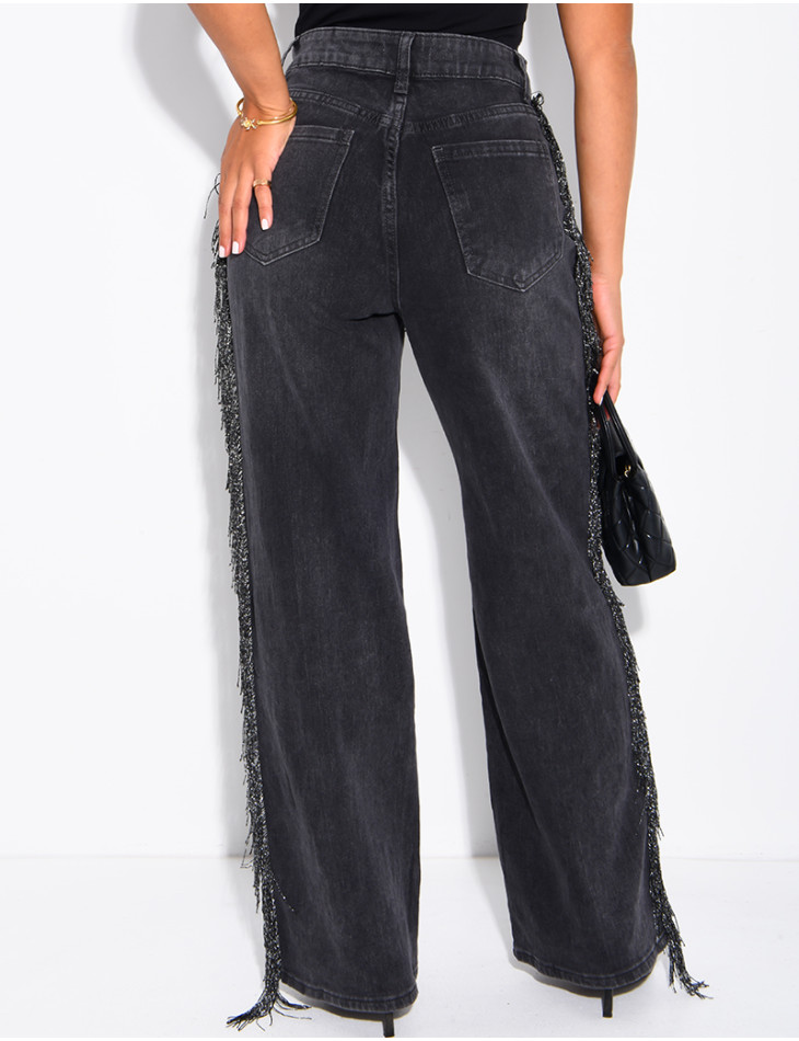 Jeans mit weitem Bein, verwaschener Optik und Paillettenfransen an den Seiten
