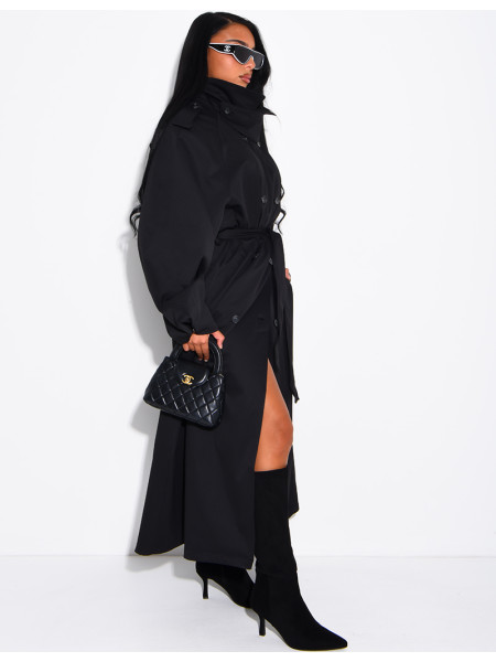 Long, oversized trench coat with a stand-up collar and a belt at the waist