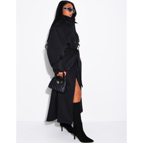 Long, oversized trench coat with a stand-up collar and a belt at the waist