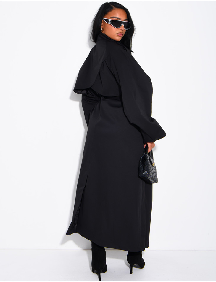 Long, oversized trench coat with a stand-up collar and a belt at the waist