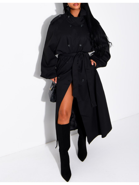 Long, oversized trench coat with a stand-up collar and a belt at the waist