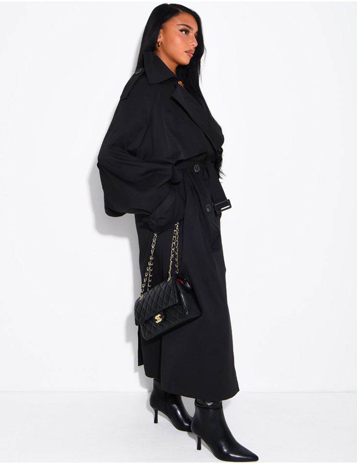 Oversized trench coat with cape-style panels on the sleeves
