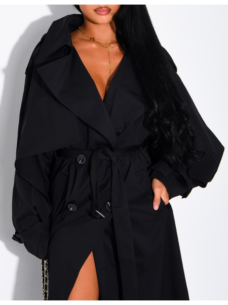 Oversized trench coat with cape-style panels on the sleeves
