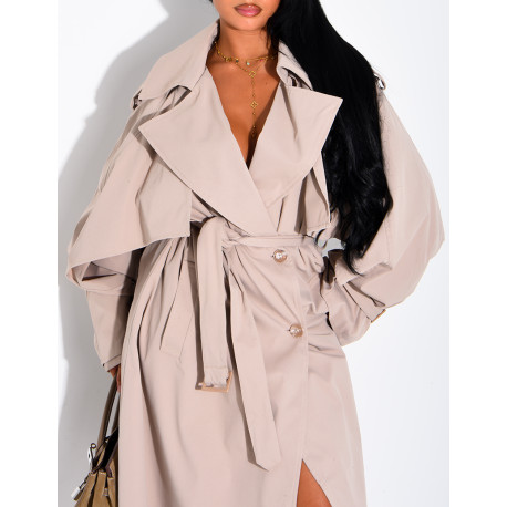 Oversized trench coat with cape-style panels on the sleeves