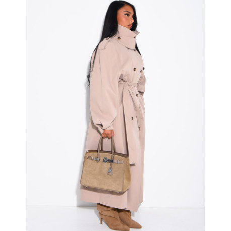 Long, oversized trench coat with a stand-up collar and a belt at the waist
