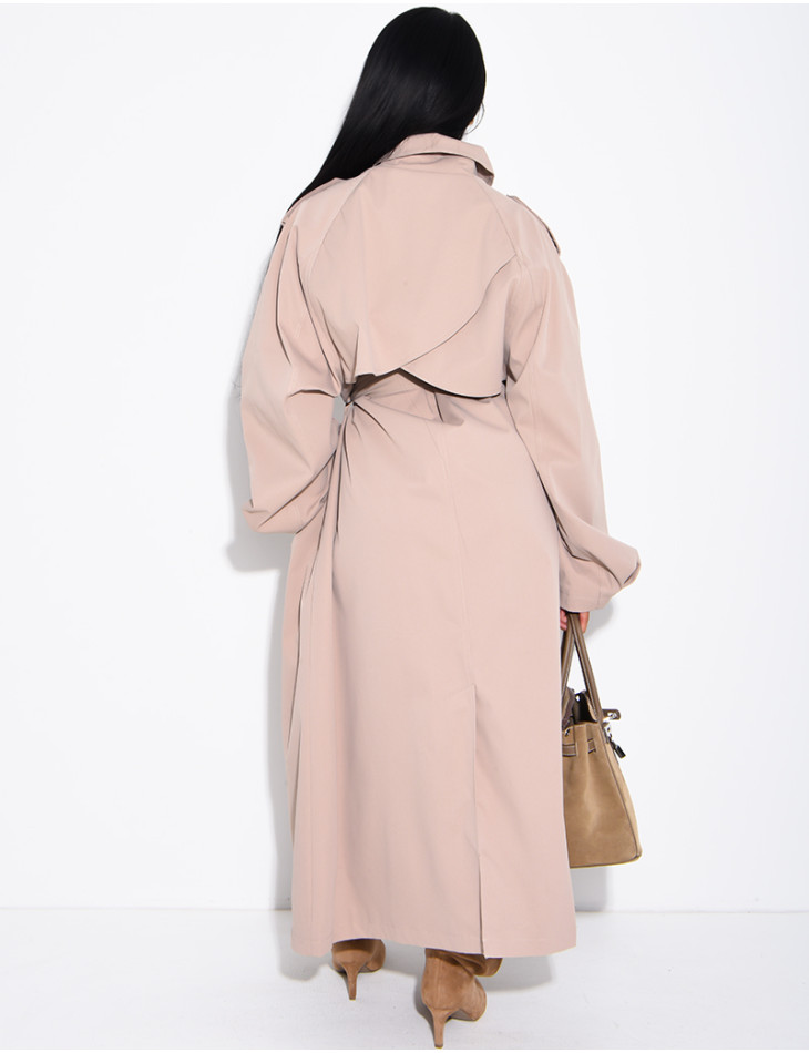 Long, oversized trench coat with a stand-up collar and a belt at the waist