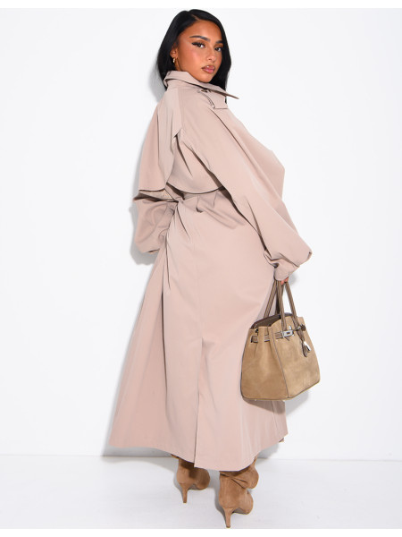 Long, oversized trench coat with a stand-up collar and a belt at the waist