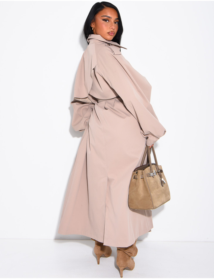 Long, oversized trench coat with a stand-up collar and a belt at the waist