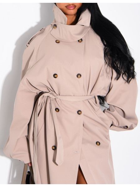 Long, oversized trench coat with a stand-up collar and a belt at the waist