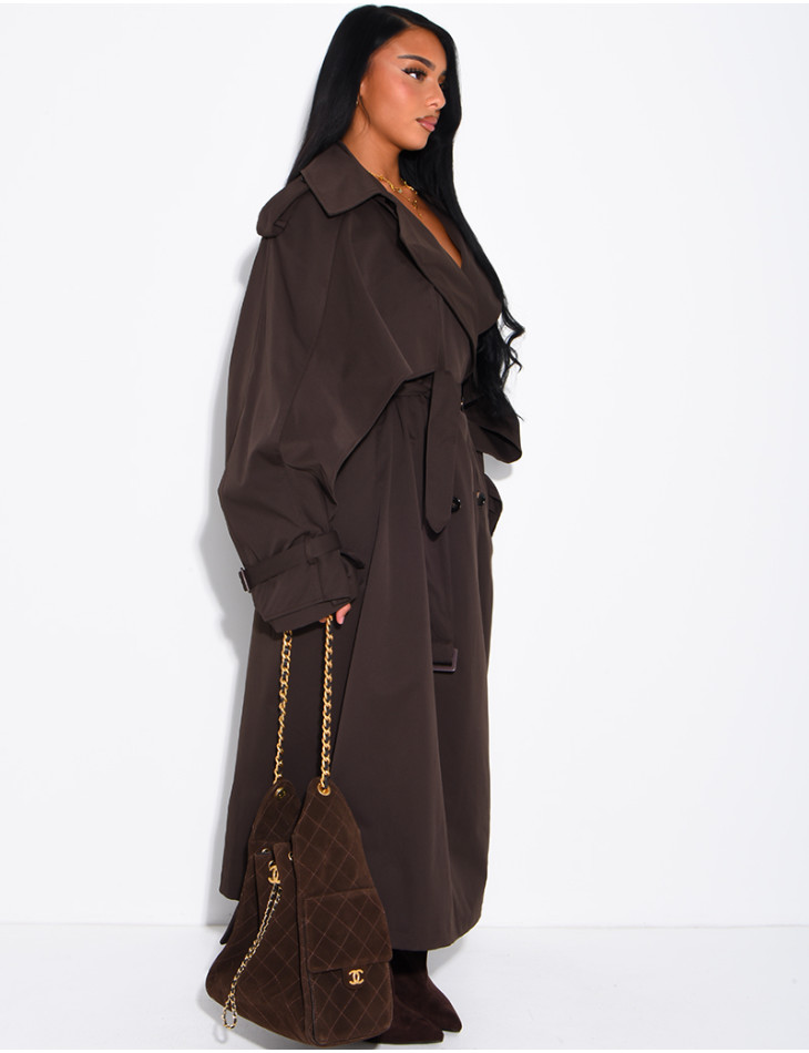 Oversized trench coat with cape-style panels on the sleeves