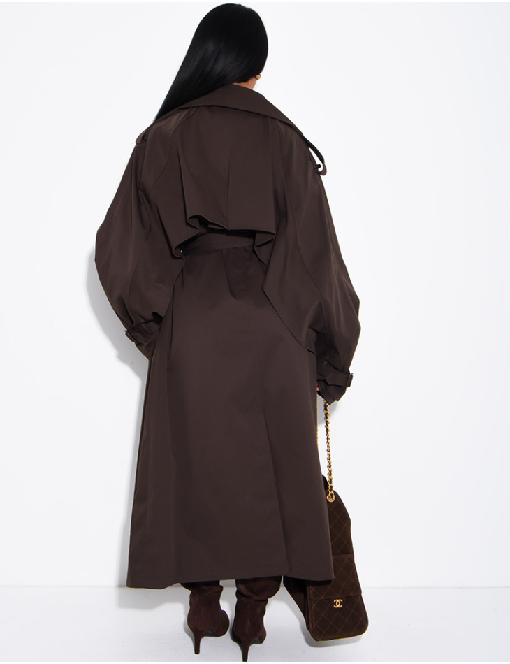 Oversized trench coat with cape-style panels on the sleeves