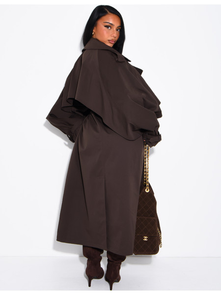 Oversized trench coat with cape-style panels on the sleeves