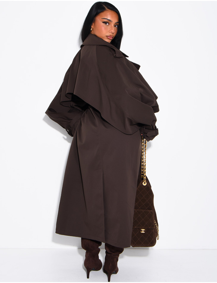 Oversized trench coat with cape-style panels on the sleeves