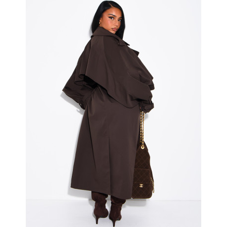 Oversized trench coat with cape-style panels on the sleeves