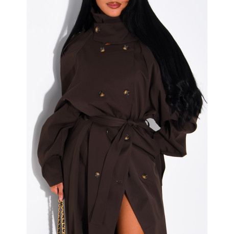 Long, oversized trench coat with a stand-up collar and a belt at the waist
