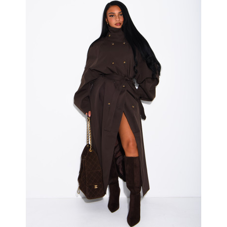 Long, oversized trench coat with a stand-up collar and a belt at the waist