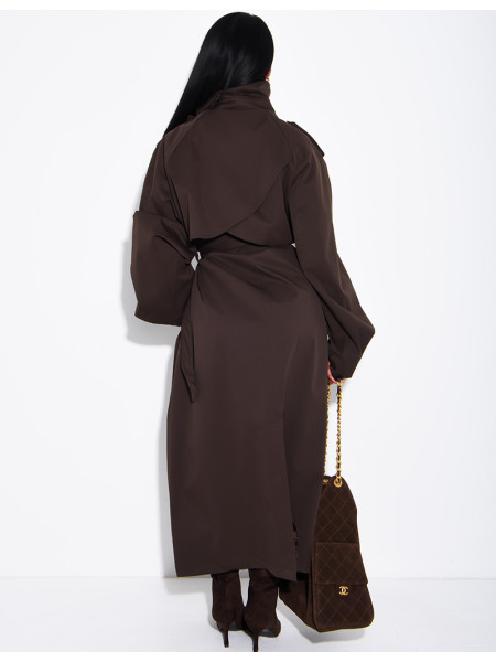 Long, oversized trench coat with a stand-up collar and a belt at the waist