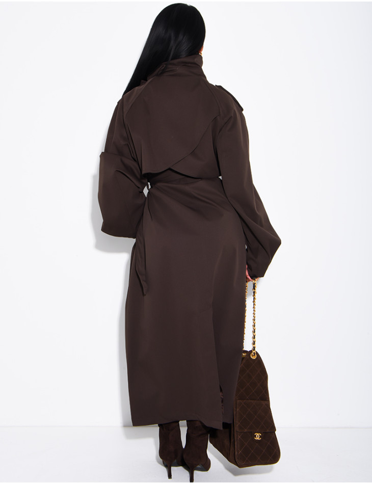 Long, oversized trench coat with a stand-up collar and a belt at the waist