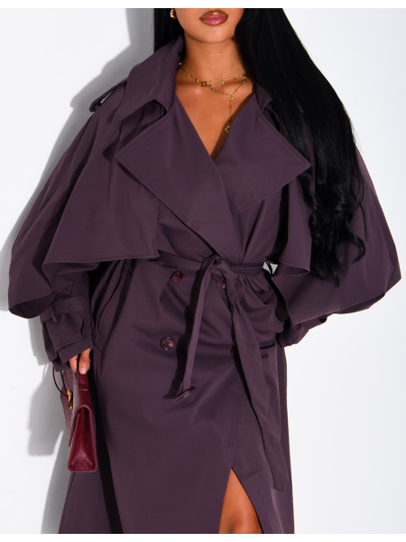 Oversized trench coat with cape-style panels on the sleeves