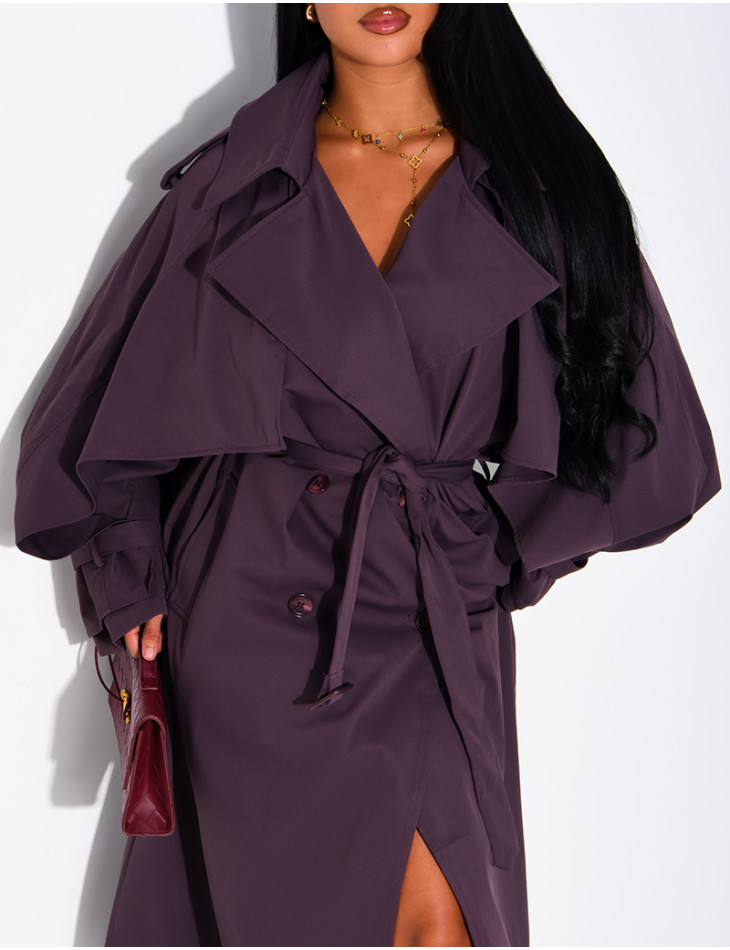 Oversized trench coat with cape-style panels on the sleeves