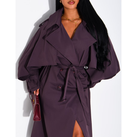 Oversized trench coat with cape-style panels on the sleeves