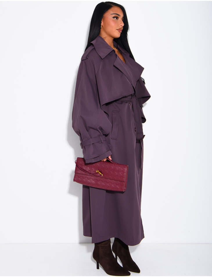 Oversized trench coat with cape-style panels on the sleeves