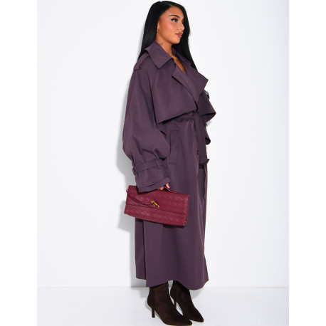 Oversized trench coat with cape-style panels on the sleeves