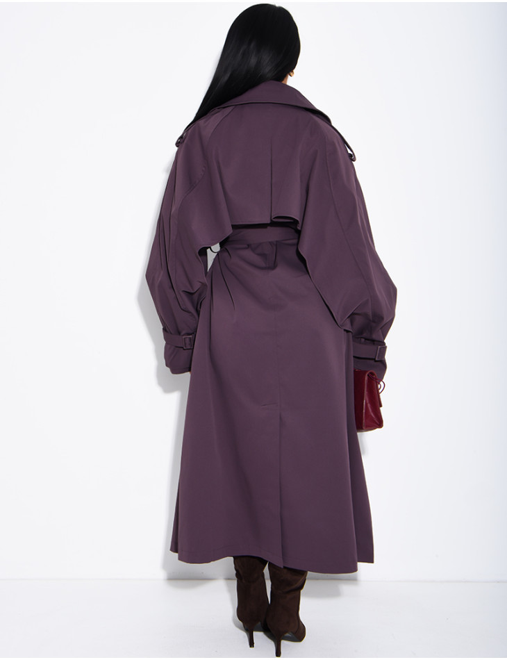 Oversized trench coat with cape-style panels on the sleeves
