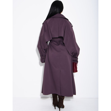Oversized trench coat with cape-style panels on the sleeves