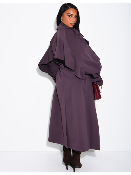Oversized trench coat with cape-style panels on the sleeves