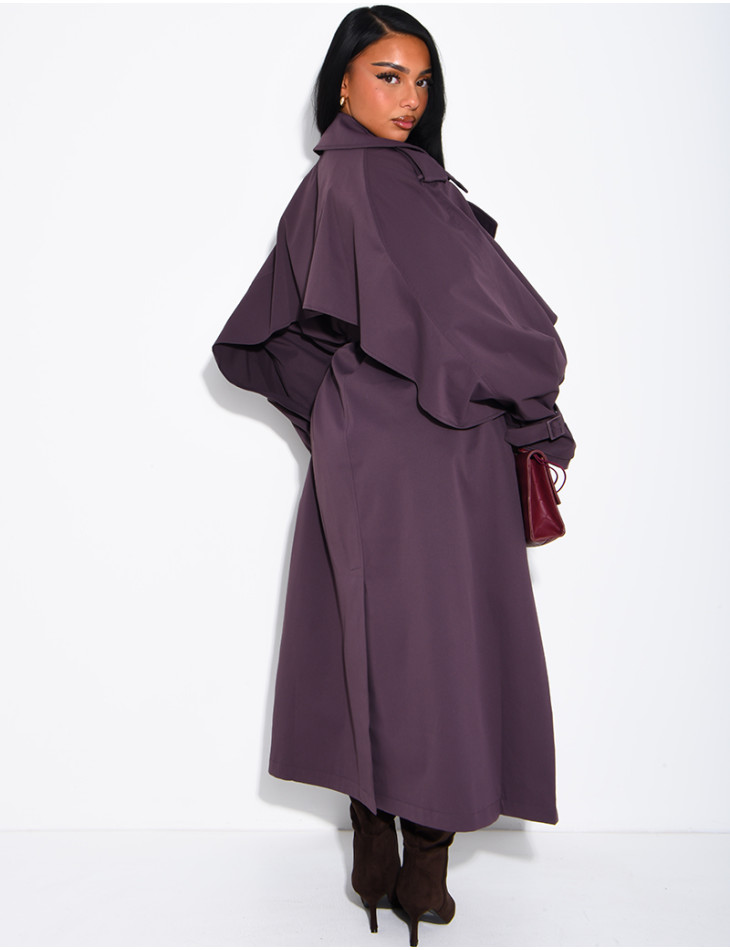 Oversized trench coat with cape-style panels on the sleeves