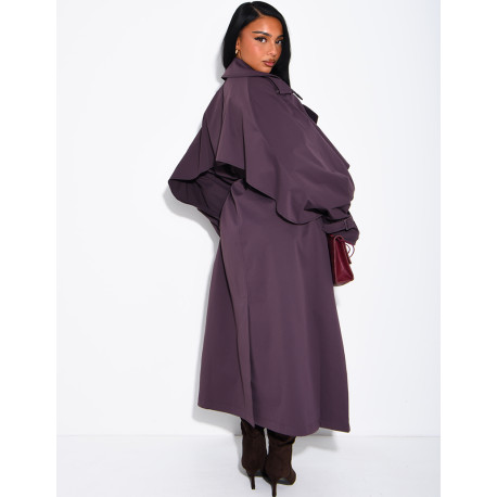 Oversized trench coat with cape-style panels on the sleeves