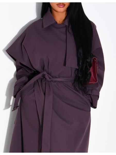 Long, oversized trench coat with a cape and waist belt
