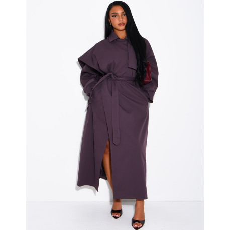 Long, oversized trench coat with a cape and waist belt