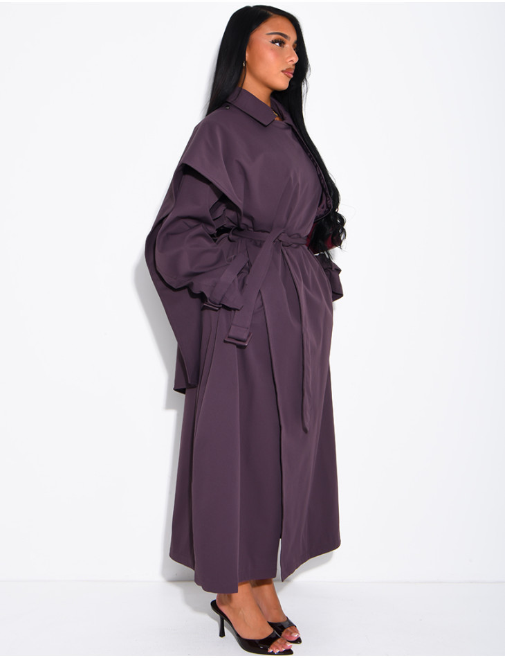 Long, oversized trench coat with a cape and waist belt