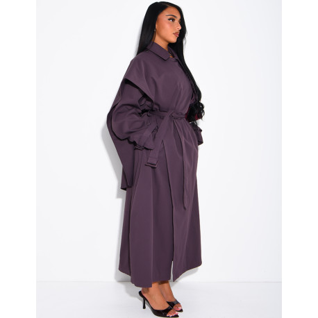 Long, oversized trench coat with a cape and waist belt