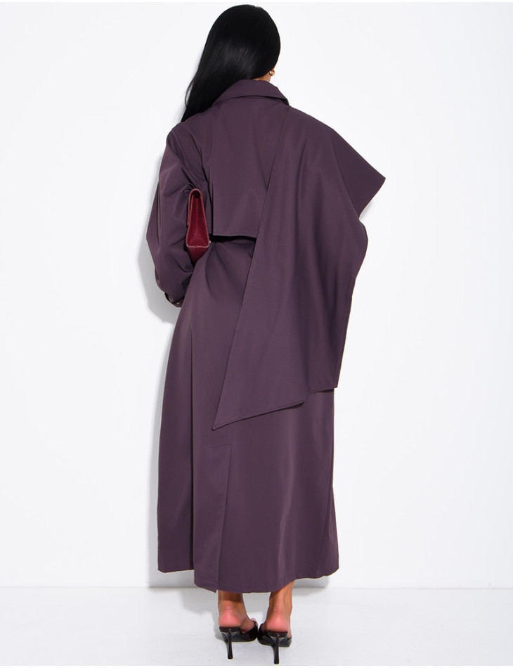 Long, oversized trench coat with a cape and waist belt