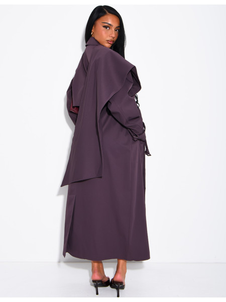 Long, oversized trench coat with a cape and waist belt
