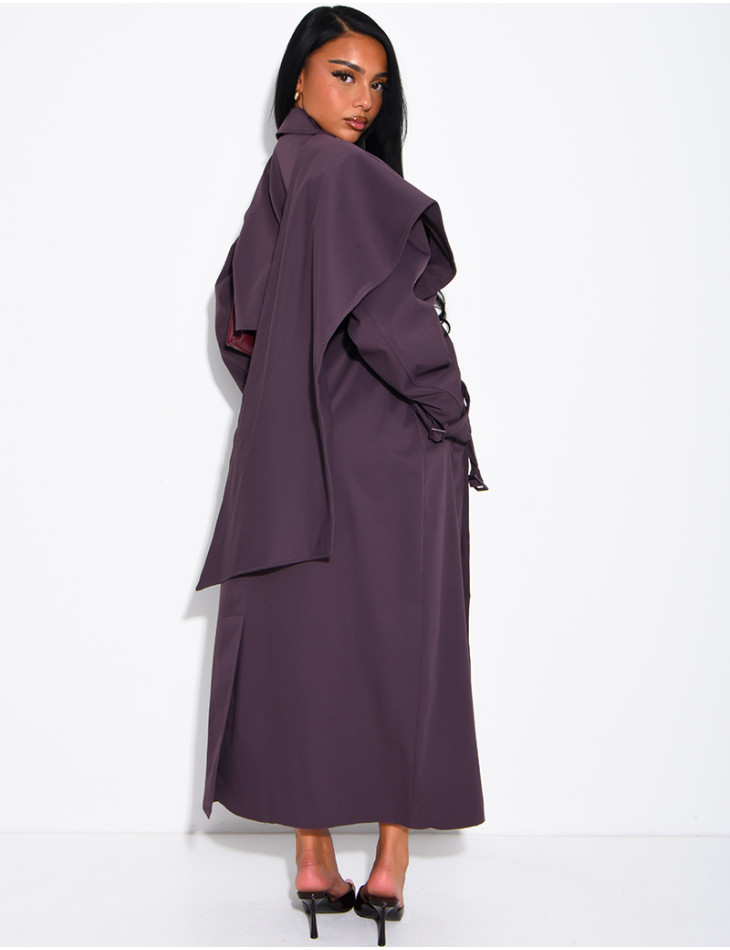 Long, oversized trench coat with a cape and waist belt