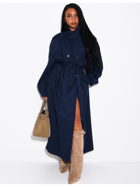 Long, oversized trench coat with a stand-up collar and a belt at the waist