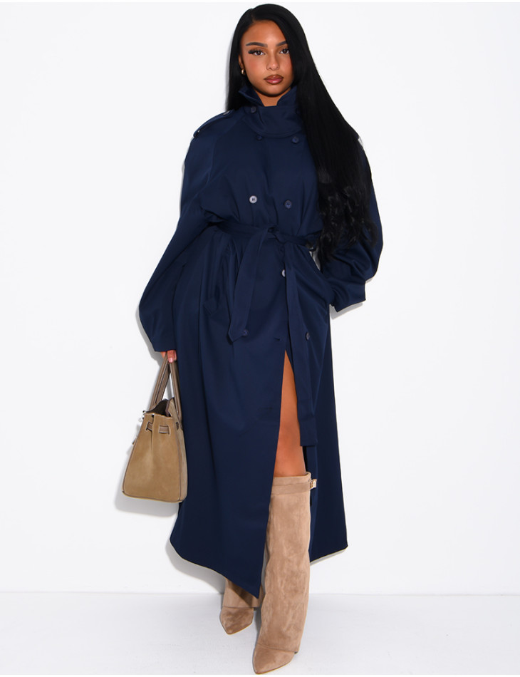 Long, oversized trench coat with a stand-up collar and a belt at the waist
