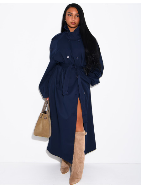 Long, oversized trench coat with a stand-up collar and a belt at the waist